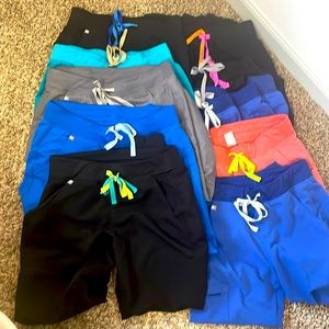 Lot of 10 pairs of FIGS scrub bottoms. Mostly joggers. Women’s size small.